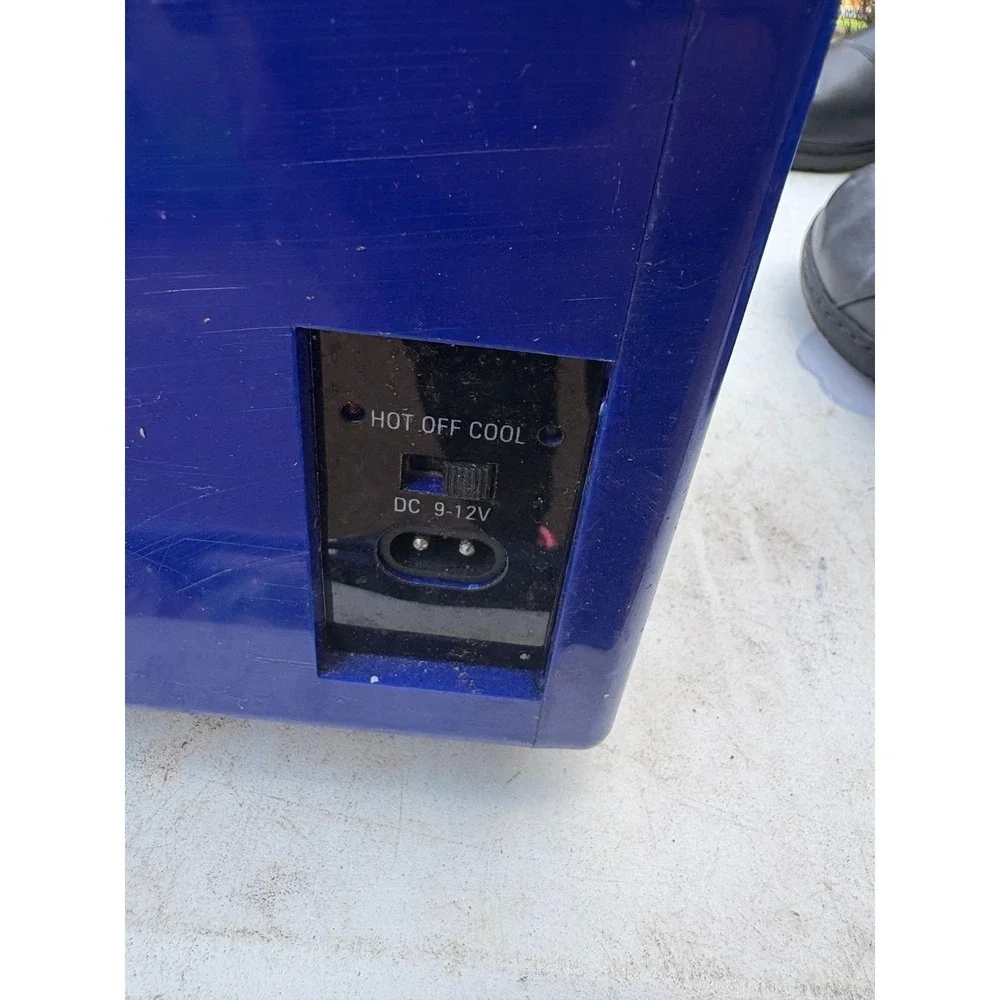 Sunbeam mini-fridge, a compact and portable cooling and warming unit.